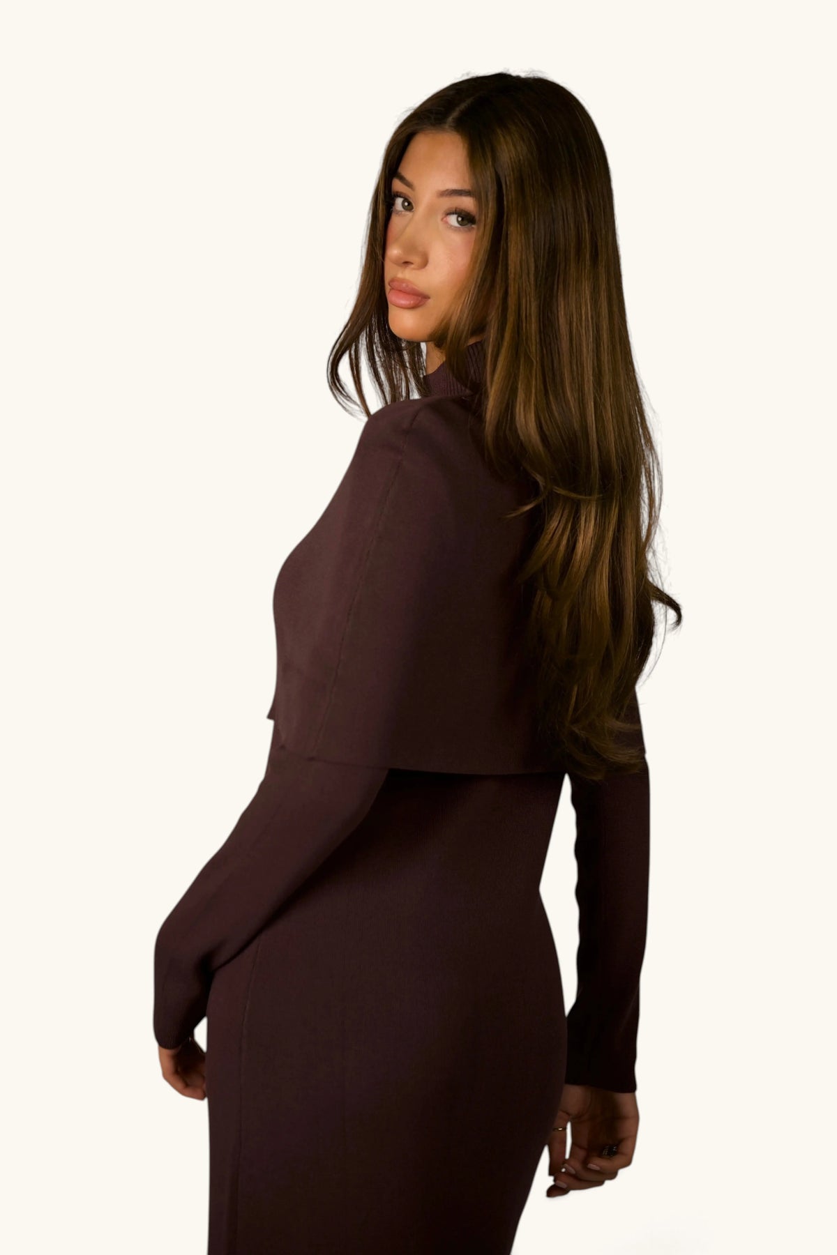 Gebreide jurk met cape-detail